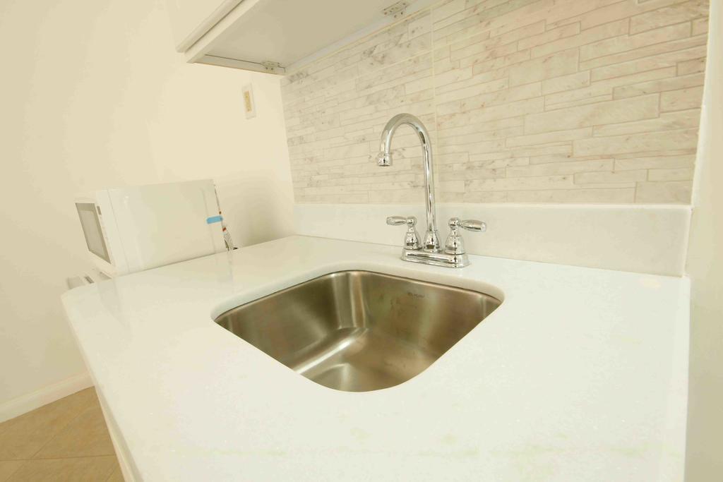 Cattleya Luxury Suites Kingston Habitación foto